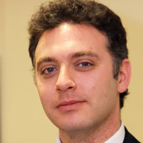 Dr Andrew Papanikitas